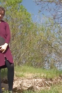 Black-haired In Black Nylons Gushes On The Ground