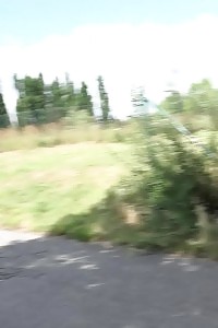 Black Haired Model Wearing Glasses Pissing Outside
