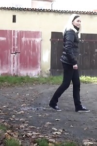 Blonde Princess Pissing Next To Some Garages