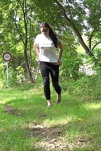 Brunette Stunner Squats And Taking A Leek Outside In Public