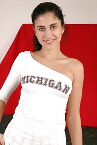 Sensational Cheerleader Does A Strip And Testing Her Moist Pussy Working Her Fingers