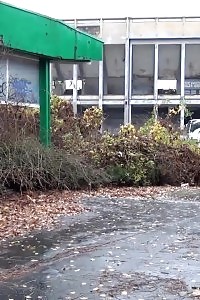 Sensational Blonde Minx Pissing In Public Near Buildings