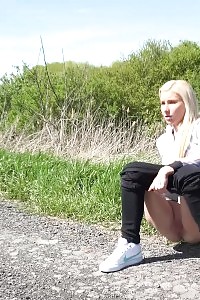 Confident Light-haired Squatting To Pee