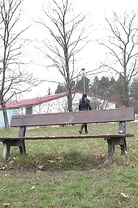 Raven Haired Bitch Pisses Over Wooden Bench
