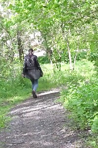 Dark Haired Doll In Glasses Pees On Path