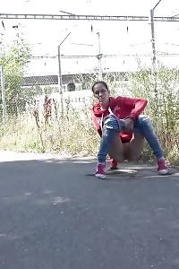 European In Glasses Squats To Pee By Railway