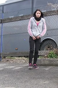 Brunette Lady Pisses By A Public Car Park