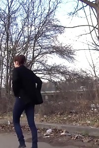 Brunette Slut Squats Near A Car To Pee Outside