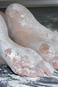 Kirsty Blue Cares Her Delightful Legs In Flour And Does A Foot Fetish