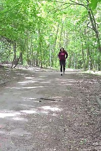 Good-looking Black Haired Girl Squats And Pees Outside