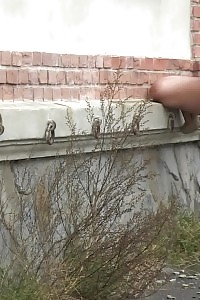 Naughty Brunette Lifts Up Her Dress To Pee